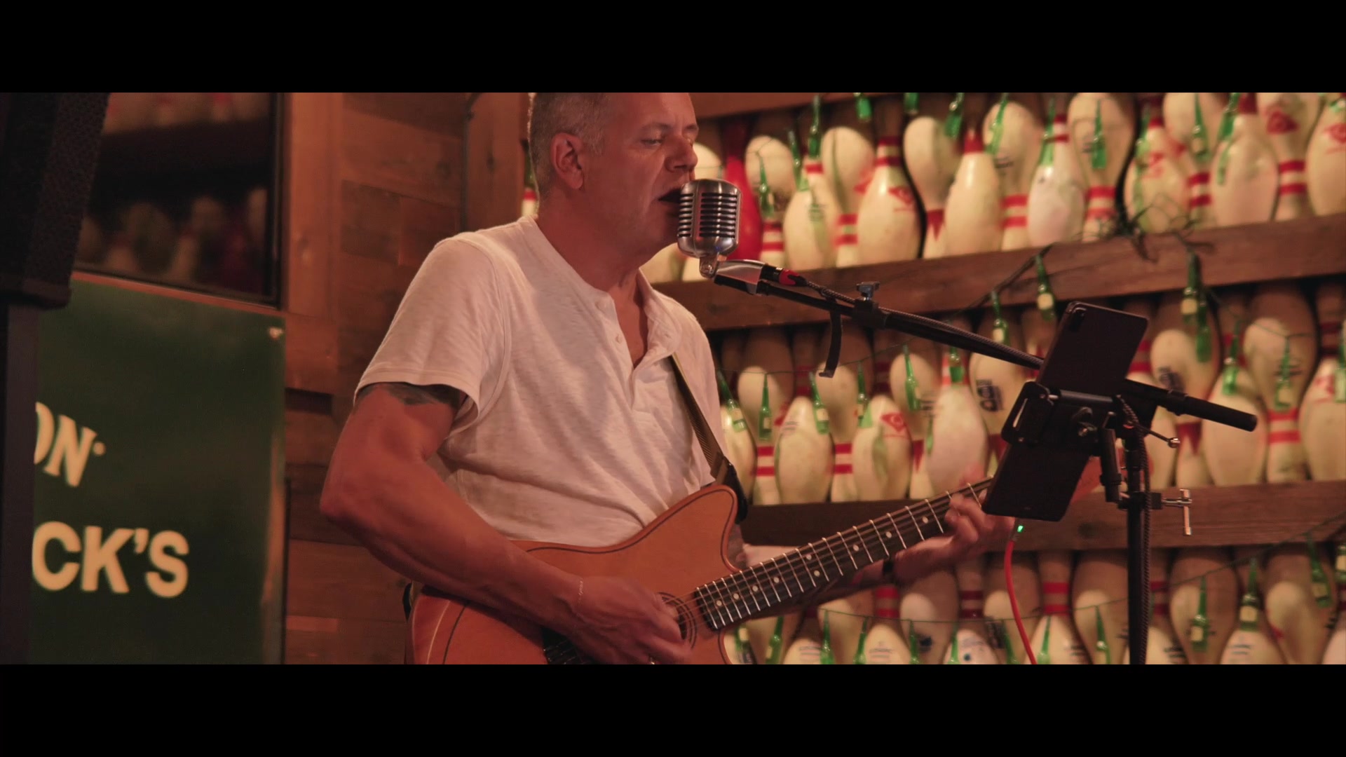 Mike Bush playing guitar live